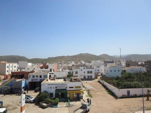 a small town with buildings and a city at Mirleft Trip in Mirleft