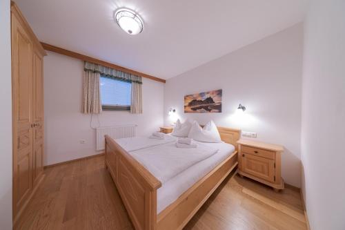 Ένα ή περισσότερα κρεβάτια σε δωμάτιο στο Appartement-Edelweiss
