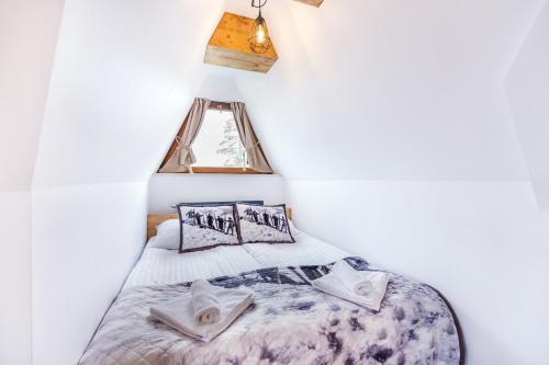 Llit o llits en una habitació de Turbacz- Apartament na Leśnej 10