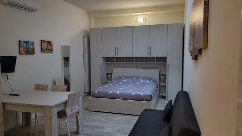 A bed or beds in a room at Savenaantico9
