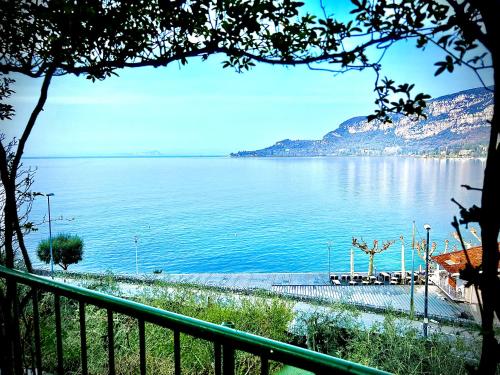 a view of a large body of water at Welcome Traveller VILLA ARIGONI in Garda