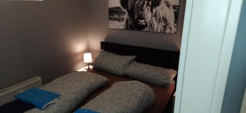 Postel nebo postele na pokoji v ubytování Kappeln Zentrum Möwennest