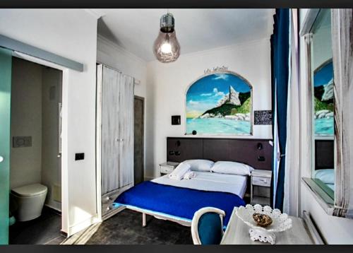 Posteľ alebo postele v izbe v ubytovaní Golfo di Orosei rooms