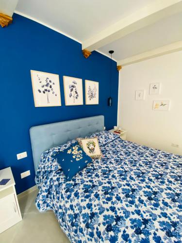 Postel nebo postele na pokoji v ubytování Casa 68 Ortigia
