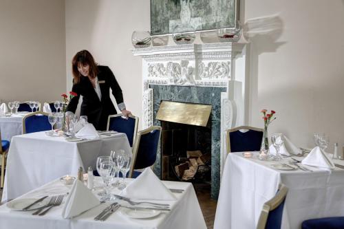 A restaurant or other place to eat at Hadlow Manor 