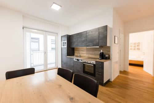 Dapur atau dapur kecil di Nadland Apartment Wehlistrasse