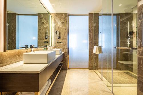 Salle de bains dans l'établissement LIUZHOU PENGYI Hotel