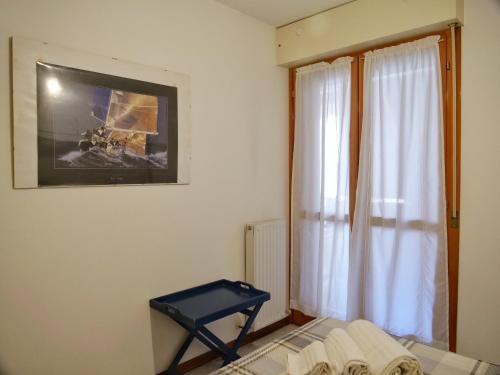 Postel nebo postele na pokoji v ubytování Cardellino, piccolo e accogliente dietro la spiaggia