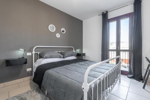 Postel nebo postele na pokoji v ubytování Via Giardini 18