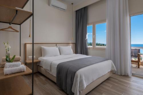 Ένα ή περισσότερα κρεβάτια σε δωμάτιο στο Casa Panorama Adults Only