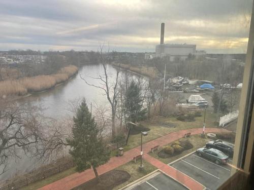 a view of a river from a window at Spark by Hilton Rahway in Rahway