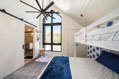 a bedroom with a bunk bed and a window at Tequila Long Time #311 in Chelan