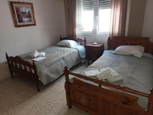 En eller flere senger på et rom på Kyri's Place Larnaca