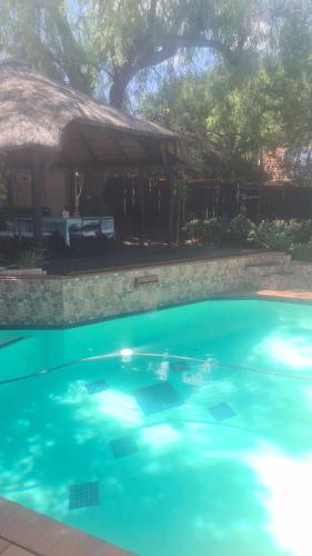 Piscina en o cerca de Halfway Gardens Home