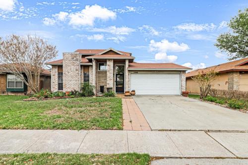 a large brick house with a driveway at Hidden Treasure in Corpus Christi