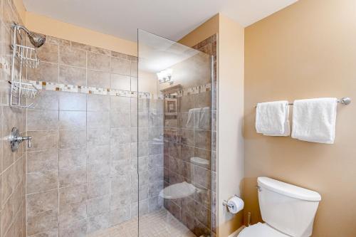 a bathroom with a shower and a toilet at Sterling Breeze 1705 in Panama City Beach