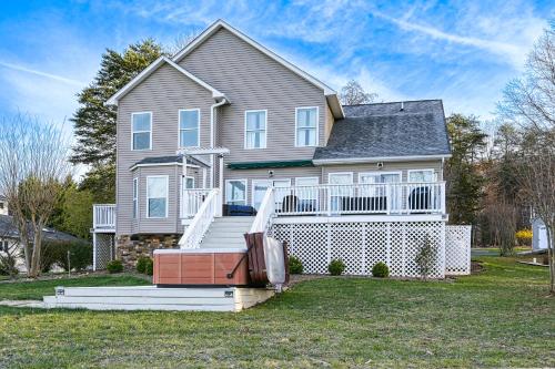 a large house with a large staircase in front of it at Doc Side in Huddleston