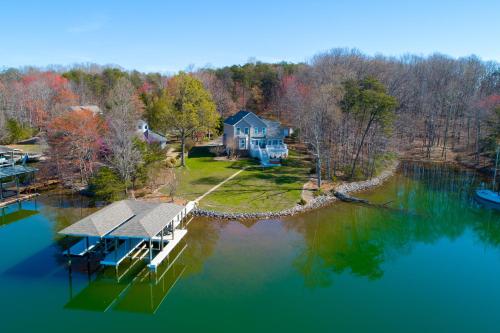 an aerial view of a house on a lake at Doc Side in Huddleston