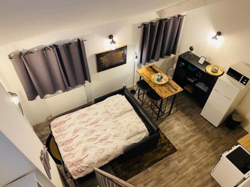 Η κουζίνα ή μικρή κουζίνα στο Le duplex Saint Gilles centre ville Baie de Somme