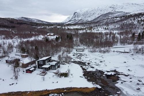 an aerial view of a house in the snow at Sand Beachhouse in Sand