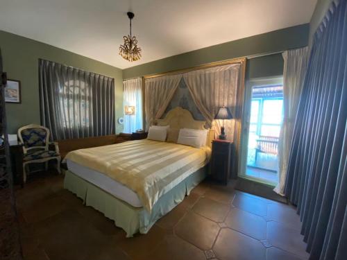 Postel nebo postele na pokoji v ubytování Raid Garden Boutique Hotel