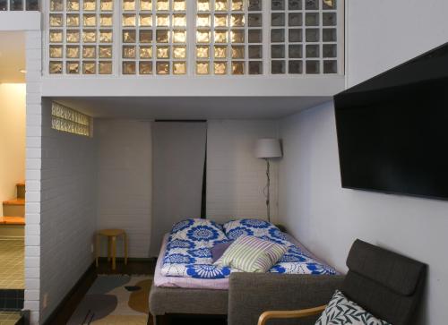 En eller flere senge i et værelse på Apartment Diana Park
