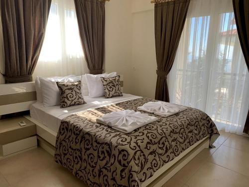 Postel nebo postele na pokoji v ubytování Eco Villa Oleg