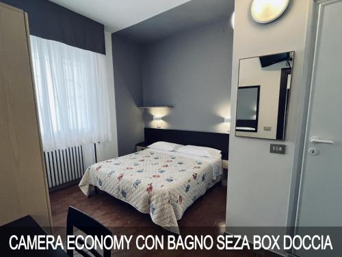 Letto o letti in una camera di Hotel Numi & Medusa