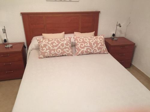 מיטה או מיטות בחדר ב-Casa Gloria 2