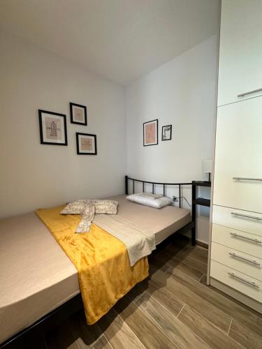 a bedroom with two beds and a dresser at Giovanni's in Serres