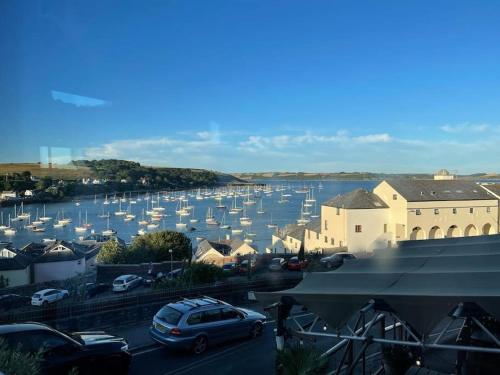 a view of a marina with boats in the water at Garden Room @ Bosanath Mill in Falmouth