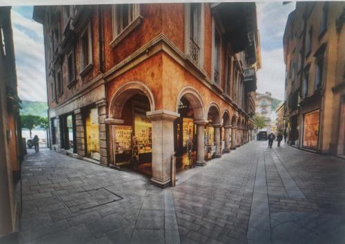 a painting of a street with a building at Casa Vista Cadro Executive in Lugano