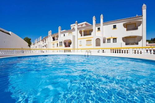 Sunny Duplex W/ Pool & Balcony by LovelyStay
