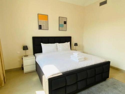 Postel nebo postele na pokoji v ubytování Key View - Qamar 4