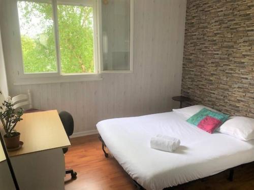 Posteľ alebo postele v izbe v ubytovaní TRENTEMOULT-REZE : 2 chambres, 65m²+parking+wifi