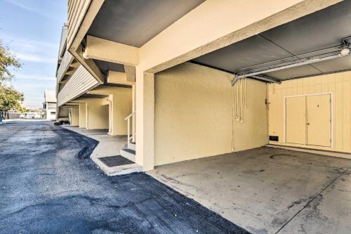 an empty parking lot outside of a building at Waterfront Nokomis Condo Less Than Half Mile to Beach! in Nokomis
