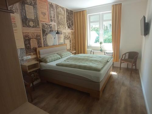 Giường trong phòng chung tại Niemann's Gasthof
