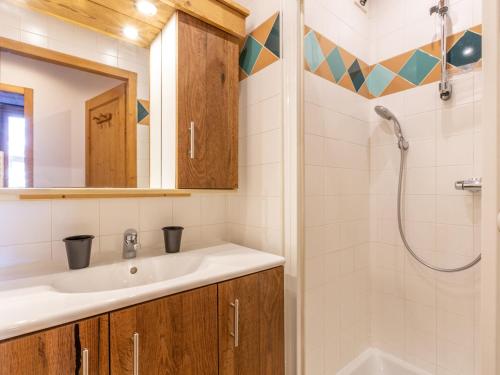 a bathroom with a sink and a shower at Appartement La Clusaz, 4 pièces, 8 personnes - FR-1-437-71 in La Clusaz