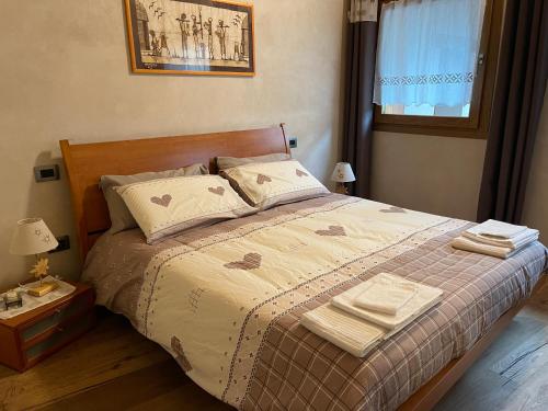 Postel nebo postele na pokoji v ubytování La Corbeille