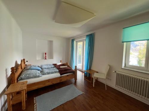 Postel nebo postele na pokoji v ubytování Ferienhaus am See