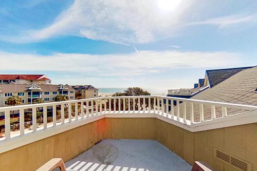 a balcony with a view of the ocean at Port O'Call C-303 in Isle of Palms
