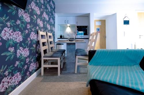 a living room with a kitchen and a dining room at Domus House Studio Apartments in Chester city centre with Free Parking by Rework Accommodation in Chester