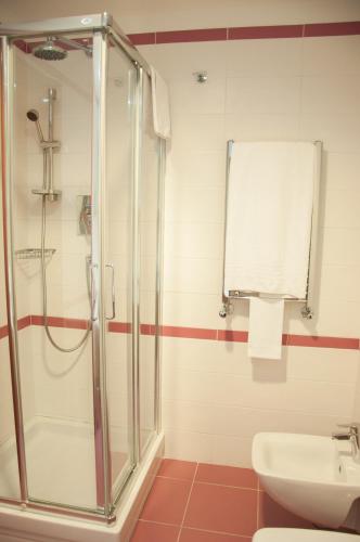 a bathroom with a shower and a sink at Grand Hotel Paradiso in Catanzaro Lido