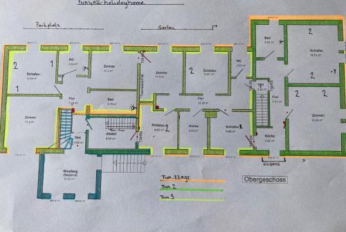 a floor plan of a building with colored lines at fun4all-holidayhome in Medebach