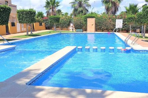 Beautiful 3 Bed Townhouse with landscaped communal pool area