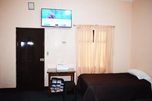 Televisyen dan/atau pusat hiburan di Hotel Realidad
