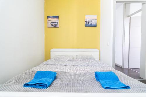 Ένα ή περισσότερα κρεβάτια σε δωμάτιο στο Modern Karpos Apartments