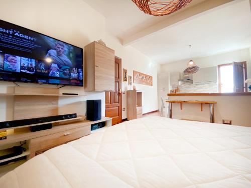 Postel nebo postele na pokoji v ubytování CityLoft Olbia