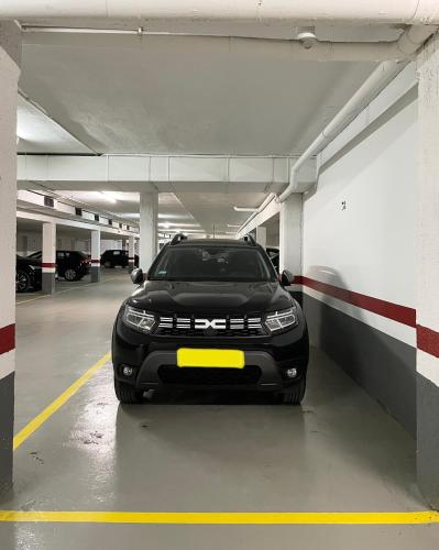 a black car parked in a parking garage at Txori-Toki in Zarautz
