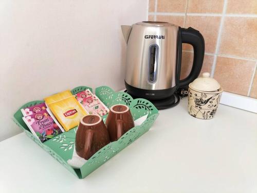 Lemon Casa con giardinoにあるコーヒーまたはお茶